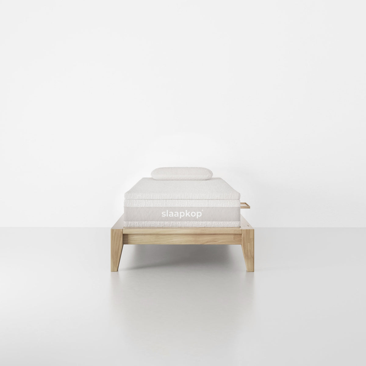 slaapkop The Frame bedframe in natural rubber wood, front view, 90 cm width