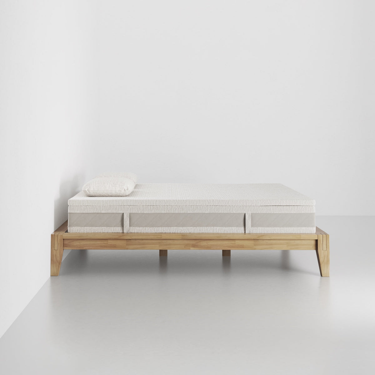 slaapkop The Frame bedframe in natural rubber wood, side view, 180 cm width